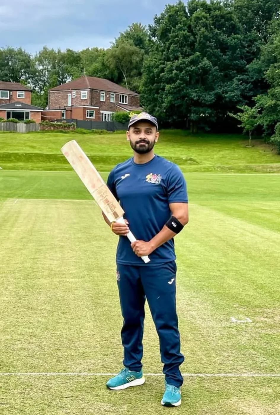 A player on the outfield with an Astaad bat