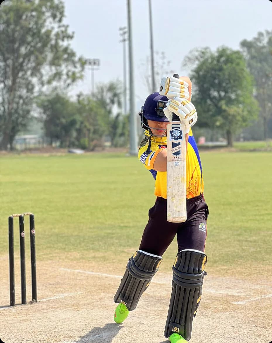 A batter at the crease with an Astaad bat